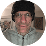 A photo of Cary Samowitz, a happy customer, in a 5-star Google review for MadMen Haircuts.